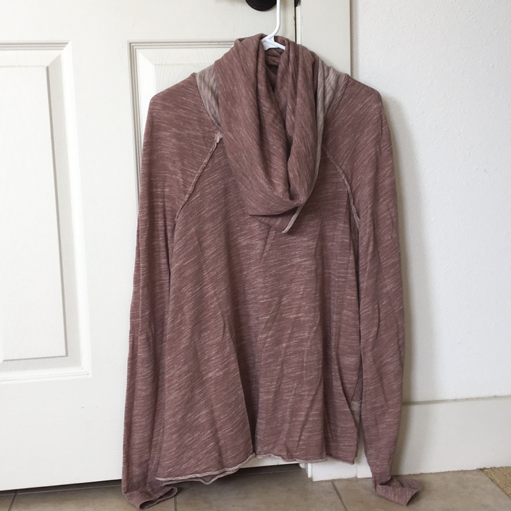A mauve long sleeve turtle neck